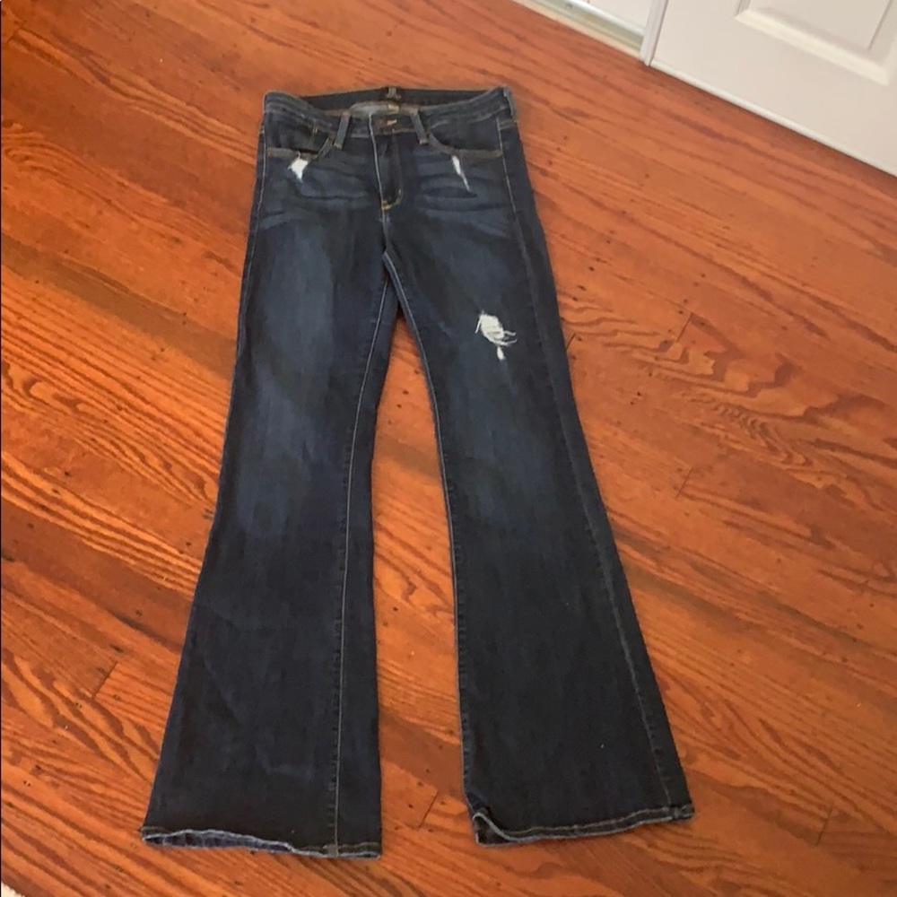 Flared distressed denim